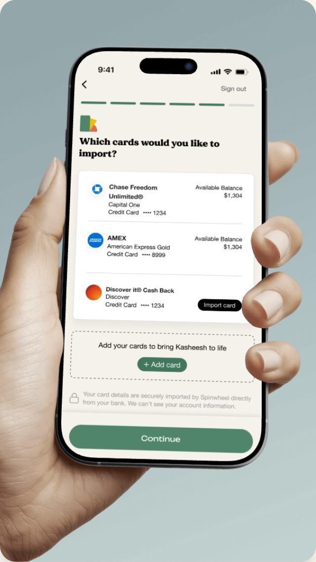 Hand holding a phone on the Kasheesh import cards screen