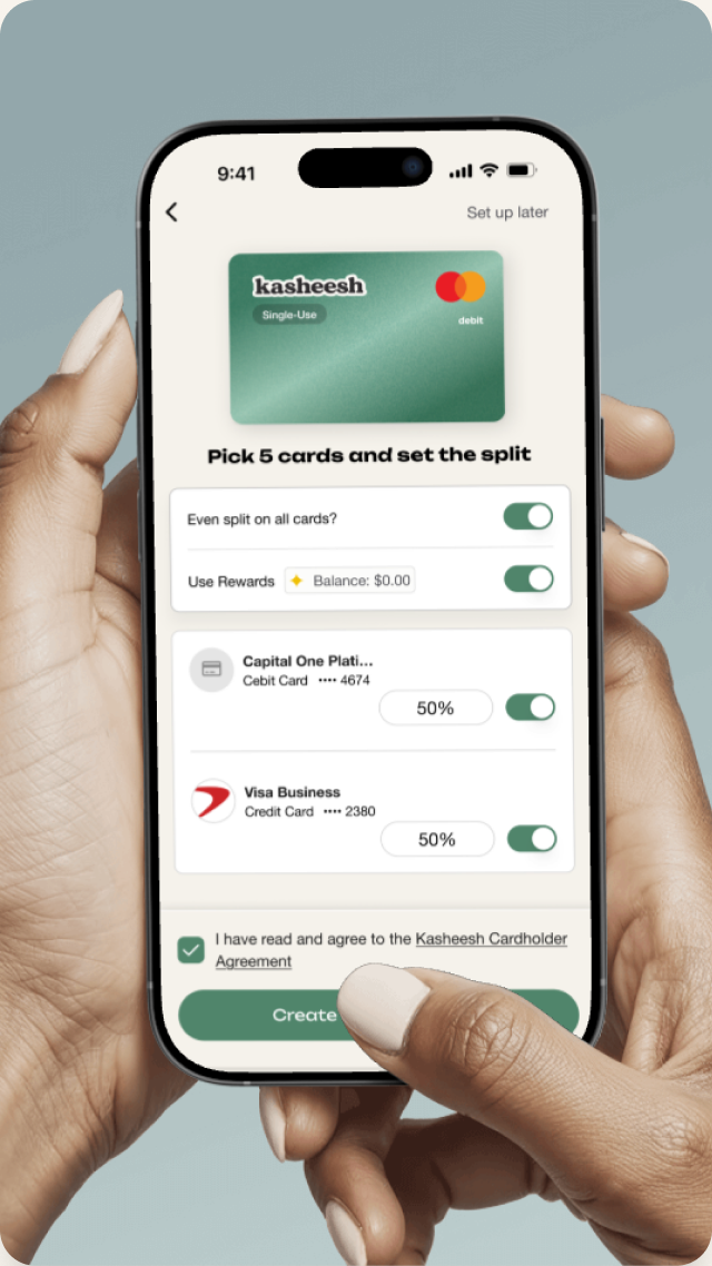 Hands holding a phone while setting a split across cards